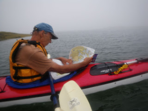 We need to carry compasses, relevant guides and charts, the MITA guidebook, and a plastic water resistant nautical chart.